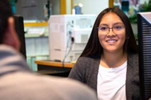 Financial Aid Staff Helping a Student