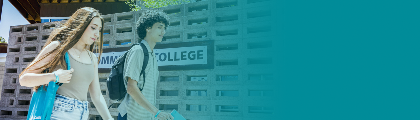 CCC student in front of the Page Campus Building