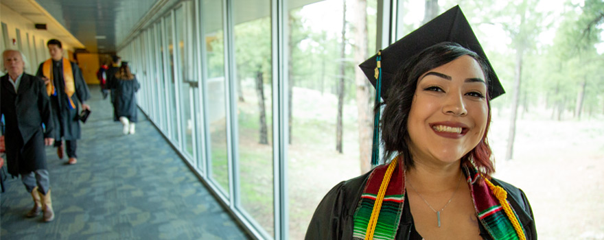 Graduate Standing in Hallway